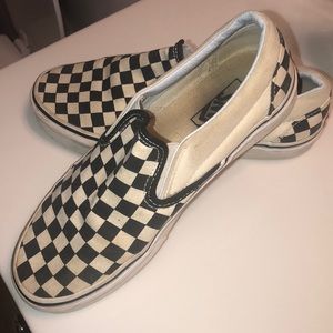 checkered vans, slightly worn